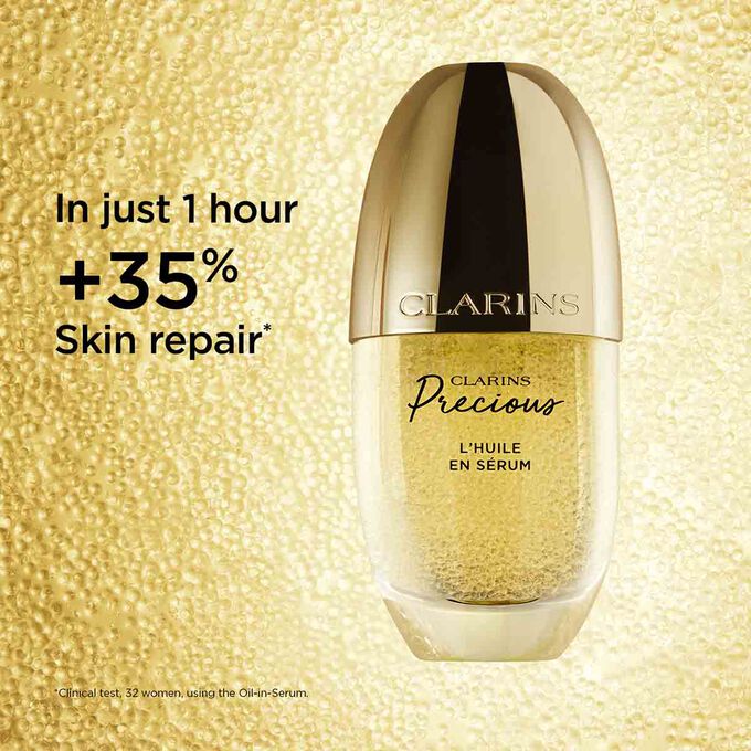 Visual of the L'Huile en Sérum highlighting its skin repair benefits