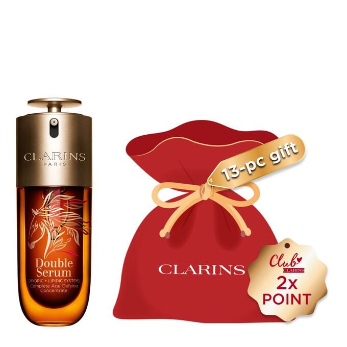 Packshot of Clarins Double Serum Chinese New Year Limited Edition on a red background with a golden horse.