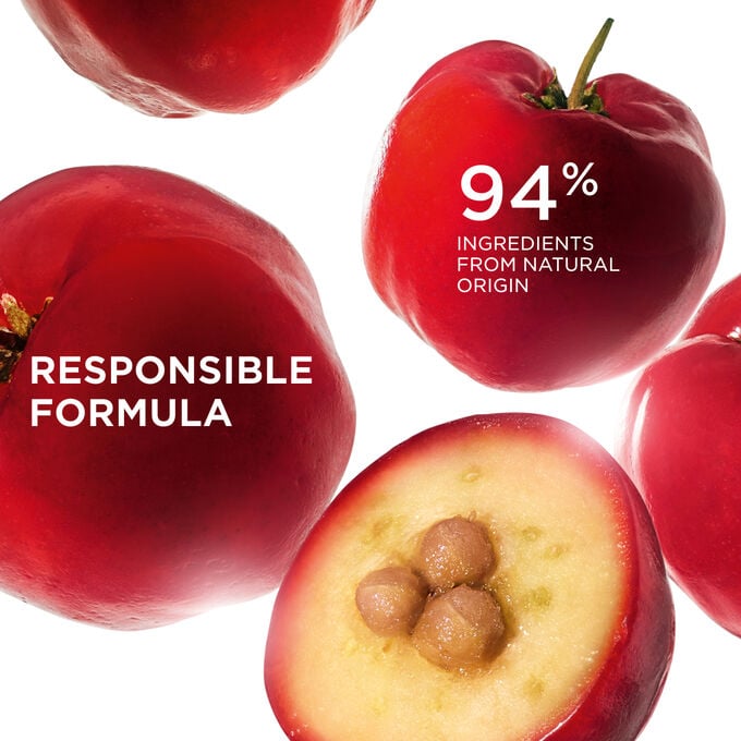 Focus on acerola fruits, illustrating Bright Plus Emulsion with 94% natural ingredients for brighter, more even skin tone.
