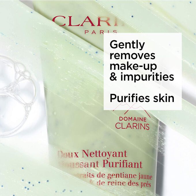 Packshot of the green tube of purifying facial foaming cleanser under foam with text about its purifying effects