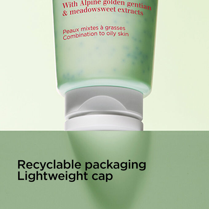 Focus on the cap of the foaming gentle cleanser to illustrate the recyclable packaging and the light weight cap