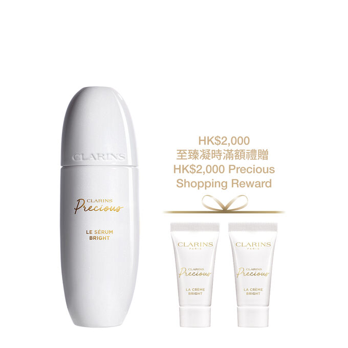 Packshot of Clarins Precious Bright Serum, surrounded by Moonlight Flower and Peptide Molecules, illustrating key ingredients for anti-aging.