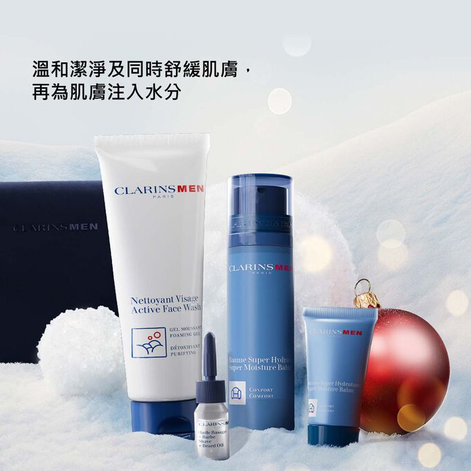 Clarins男士聖誕禮品套裝宣傳照，強調適合乾性或敏感肌膚使用，帶來保濕、潔淨和舒緩的效果